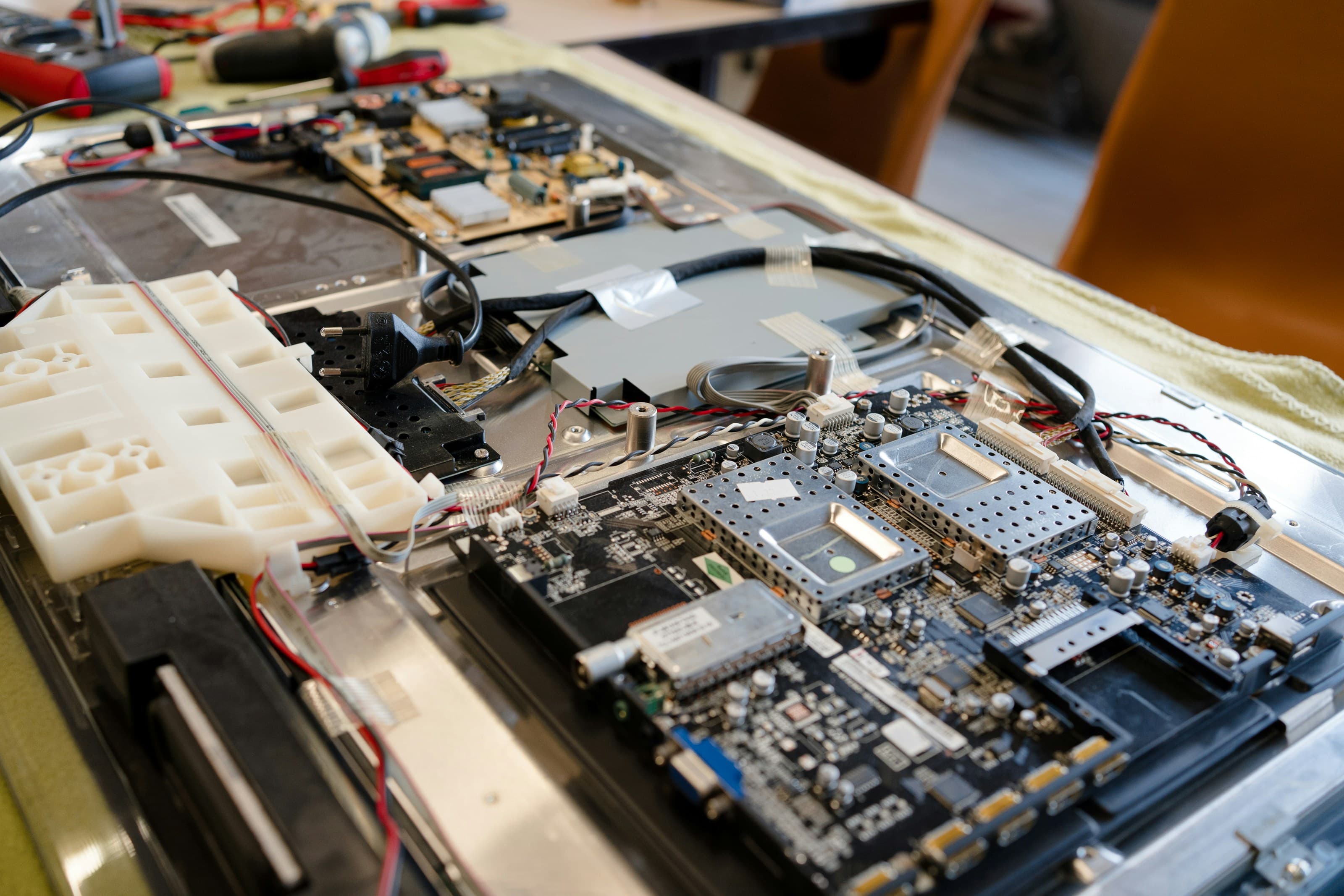 Detailed hardware repair work on a circuit board